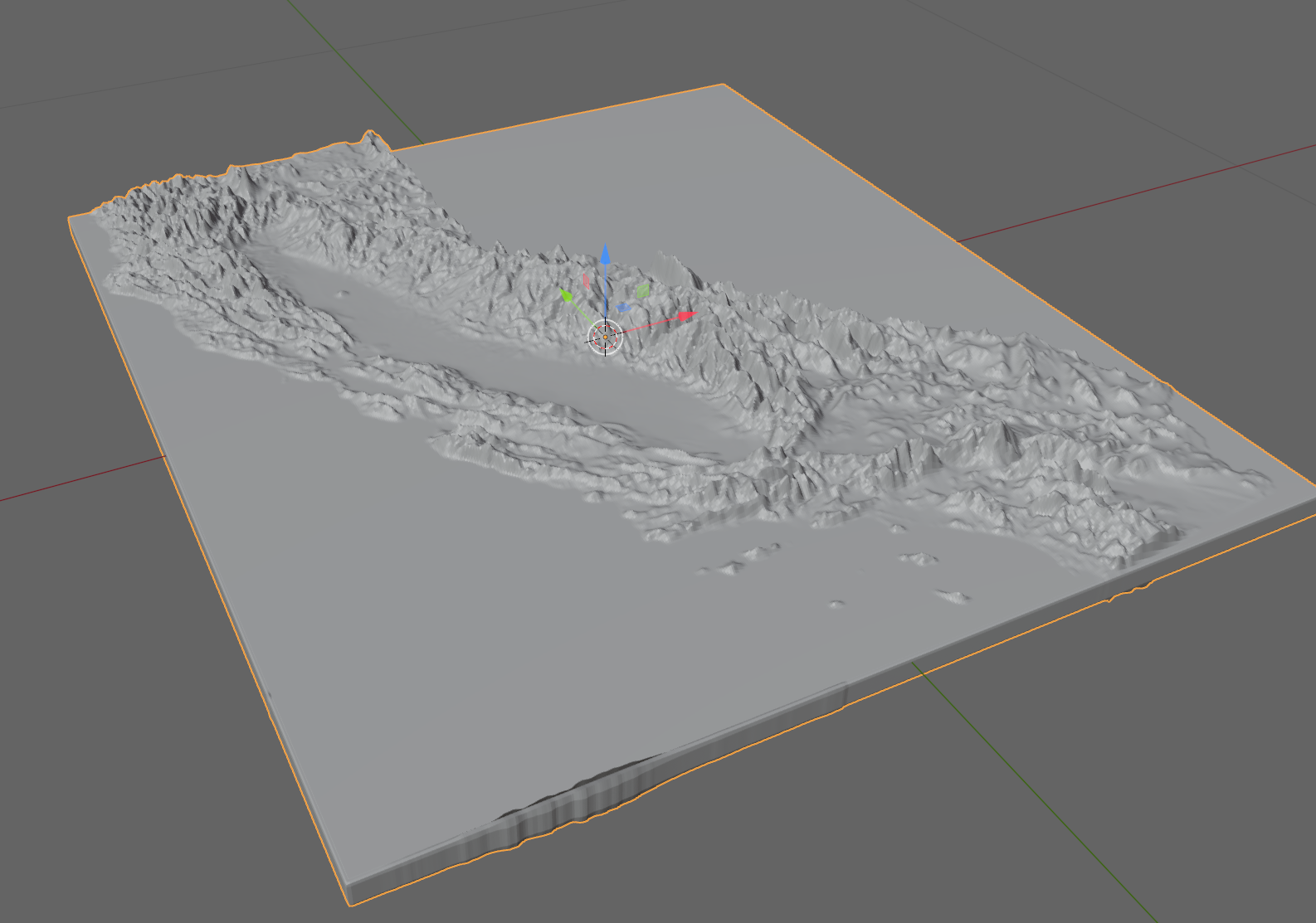 3D viewport in Blender showing a topo-displaced mesh that looks likeCalifornia